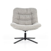 Lichtgrijze draaifauteuil zonder armleuningen in een dikke comfortabele boucléstof. Fauteuil Danica is van het merk Eleonora, verkrijgbaar bij De Houten Kruik,