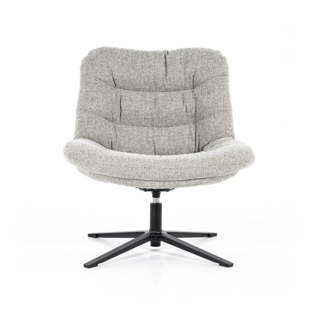 Lichtgrijze draaifauteuil zonder armleuningen in een dikke comfortabele boucléstof. Fauteuil Danica is van het merk Eleonora, verkrijgbaar bij De Houten Kruik,