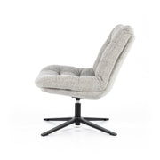 Lichtgrijze draaifauteuil zonder armleuningen in een dikke comfortabele boucléstof. Fauteuil Danica is van het merk Eleonora, verkrijgbaar bij De Houten Kruik,