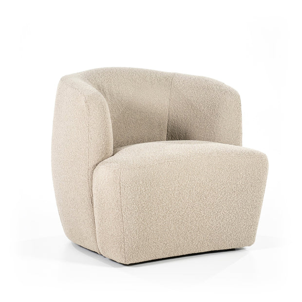 Mooie ronde fauteuil in een beige boucléstof voor een knus interieur