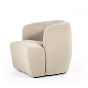 Mooie ronde fauteuil in een beige boucléstof voor een knus interieur