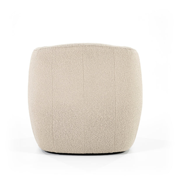 Mooie ronde fauteuil in een beige boucléstof voor een knus interieur