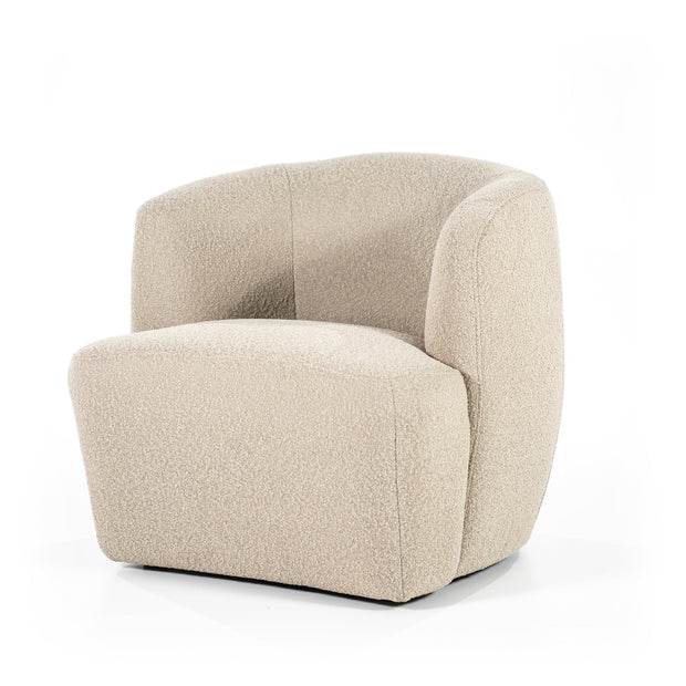 Mooie ronde fauteuil in een beige boucléstof voor een knus interieur