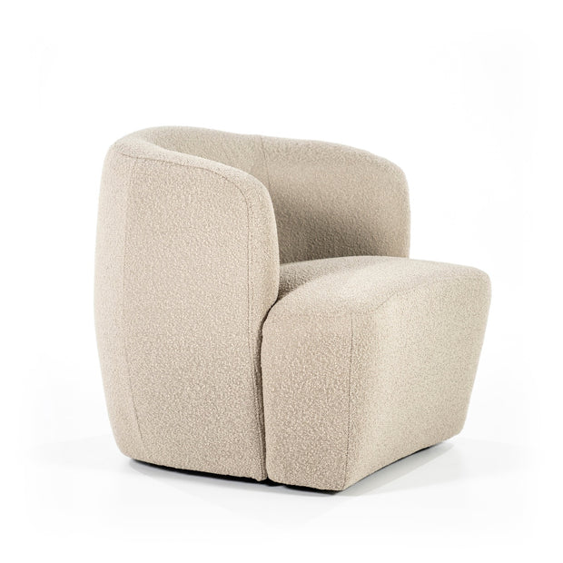 Mooie ronde fauteuil in een beige boucléstof voor een knus interieur