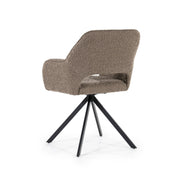 Groene draaistoel in boucléstof met open rug en zwarte trapeziumpoten voor een knusse look aan je eettafel