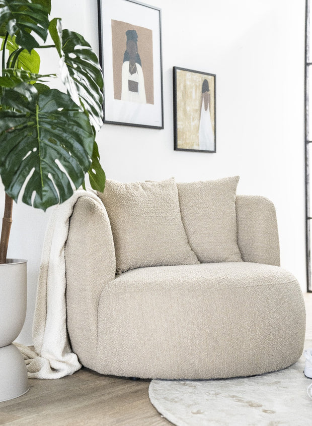 Ronde fauteuil beige met rugkussens van het merk Eleonora in boucléstof