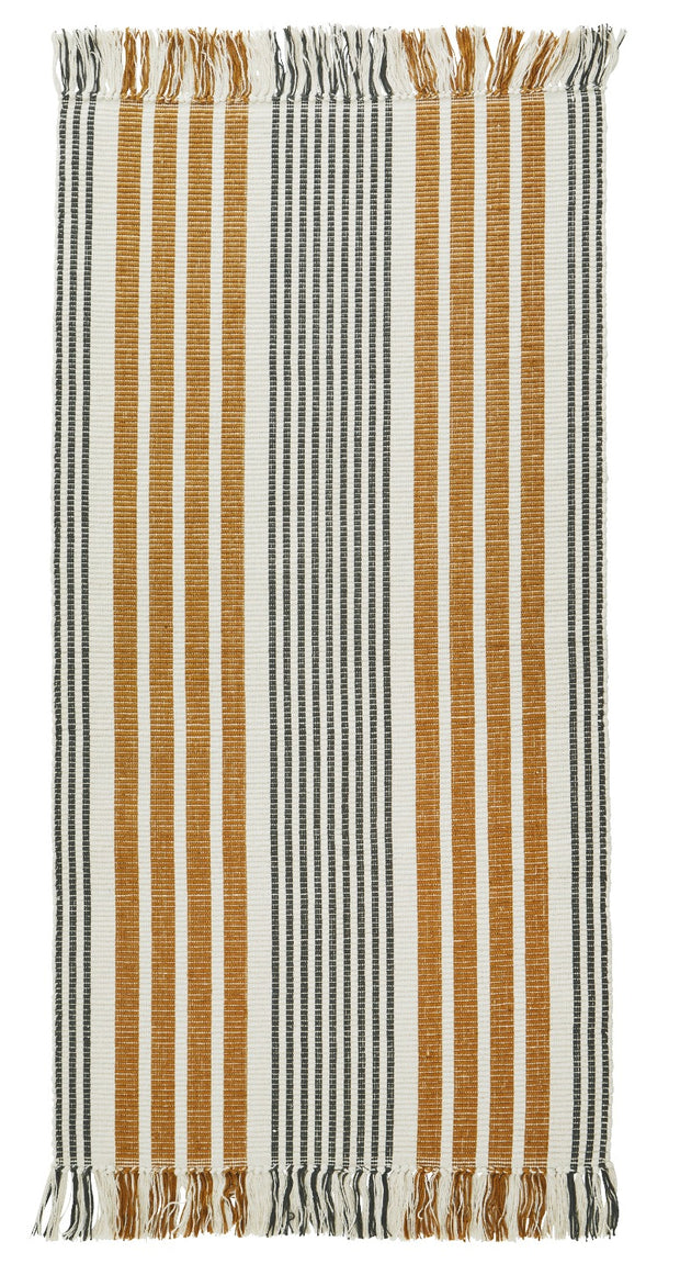 Lang tapijt voor badkamer met strepen in ecru roest en zwart met franjes 